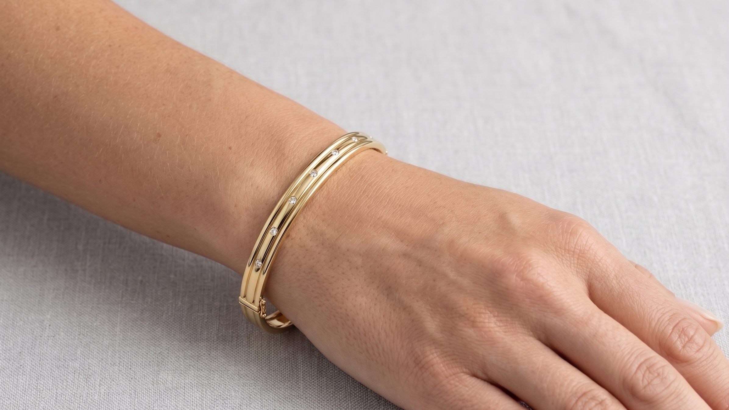 Yellow Gold Bangle with 0.20ct of Diamonds